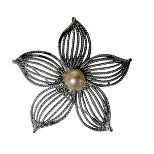 Vintage Sarah Coventry Silver Tone flower brooch with faux pearl center signed.